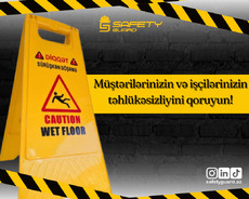 Sahənin (yerin) yaş olmasını xəbərdarlıq nişanı(iki tərəfli)